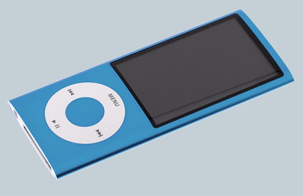 A blue iPod sits on a table with a grey background.